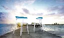 1689265121_shiny-white-chair-outdoor-garden-seaside.webp